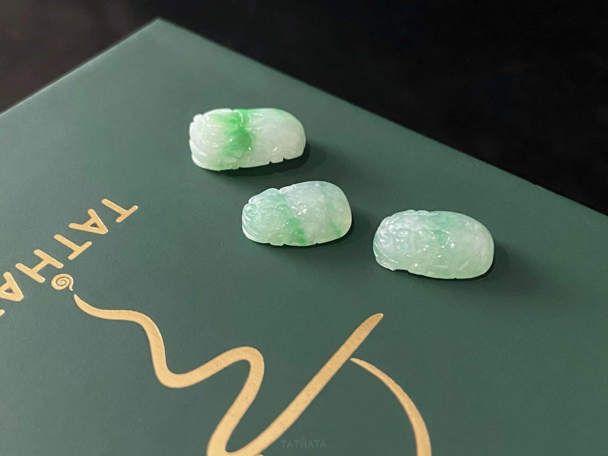 A green dot fortune Pixiu loose jadeite.