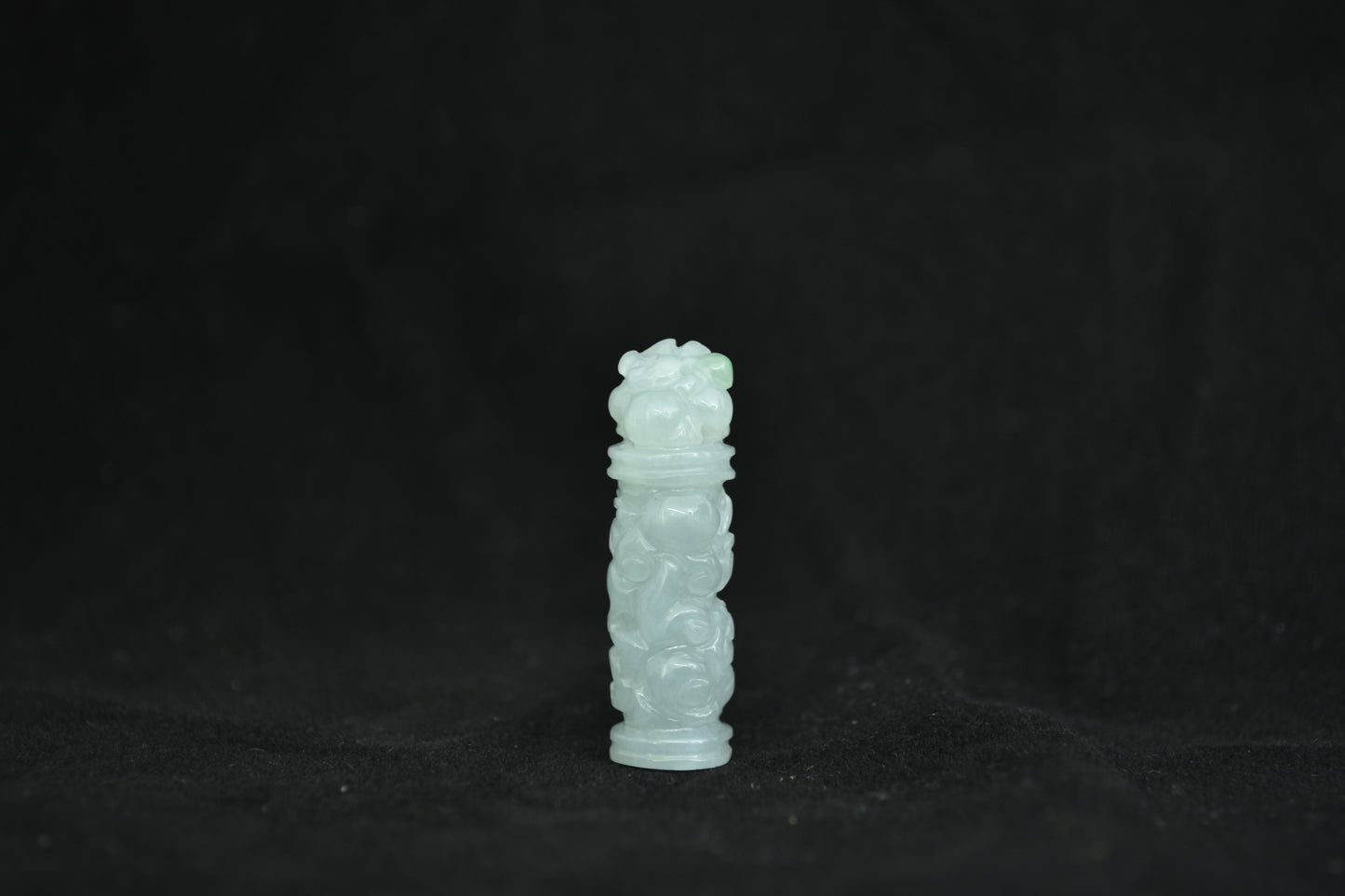 A milky white jade column, inspired by the traditional Chinese ornamental pillar.