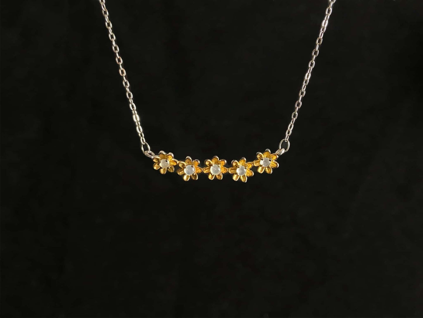 A daisy dew bloom jadeite necklace.
