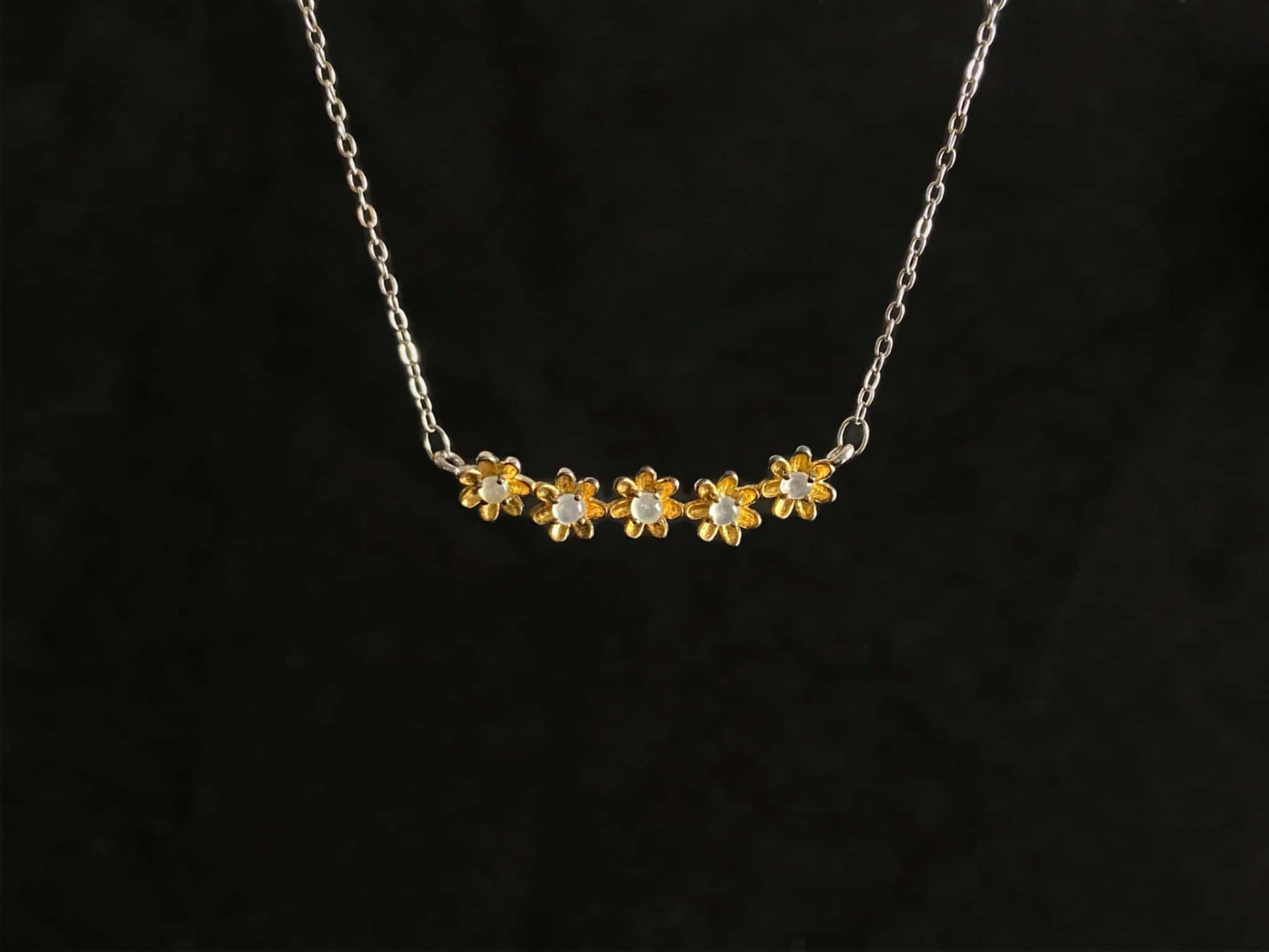 A daisy dew bloom jadeite necklace.