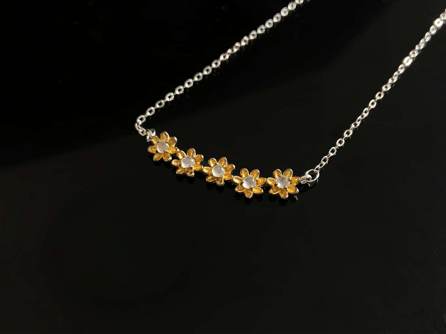 A daisy dew bloom jadeite necklace.