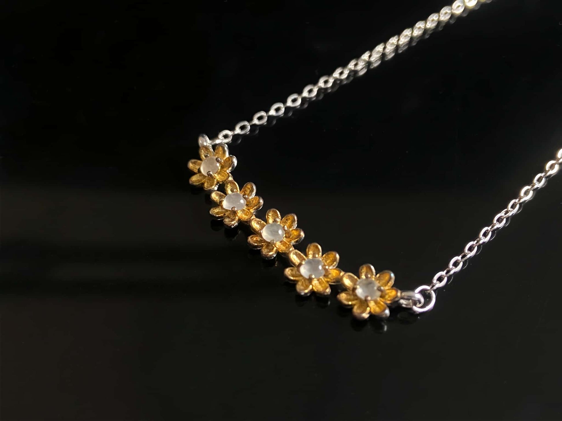 A daisy dew bloom jadeite necklace.