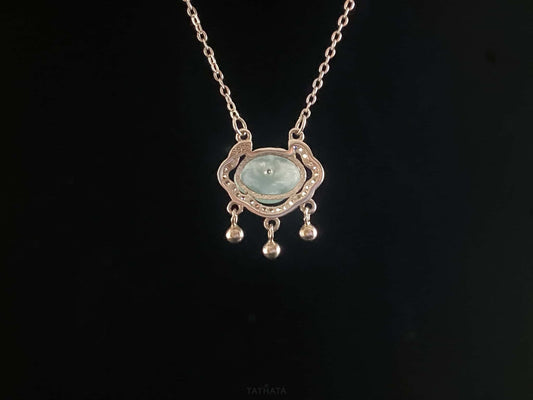 A ice green Ruyi chime jadeite pendant.