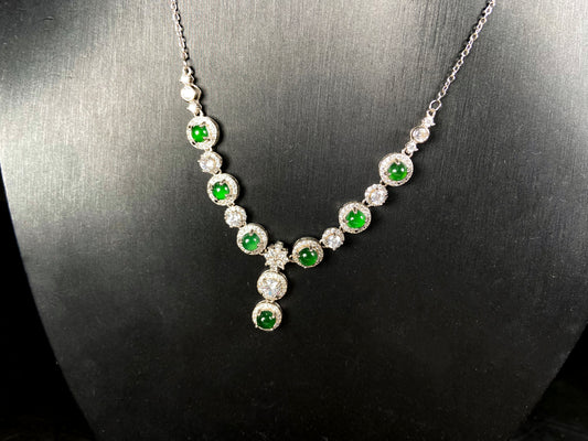 A vibrant green sparkle jadeite pendant.