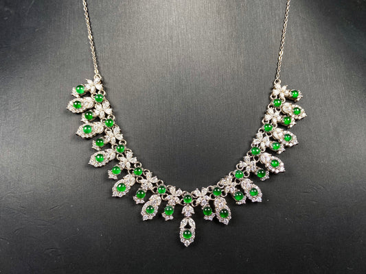 A lush green bloom drape jadeite pendant.