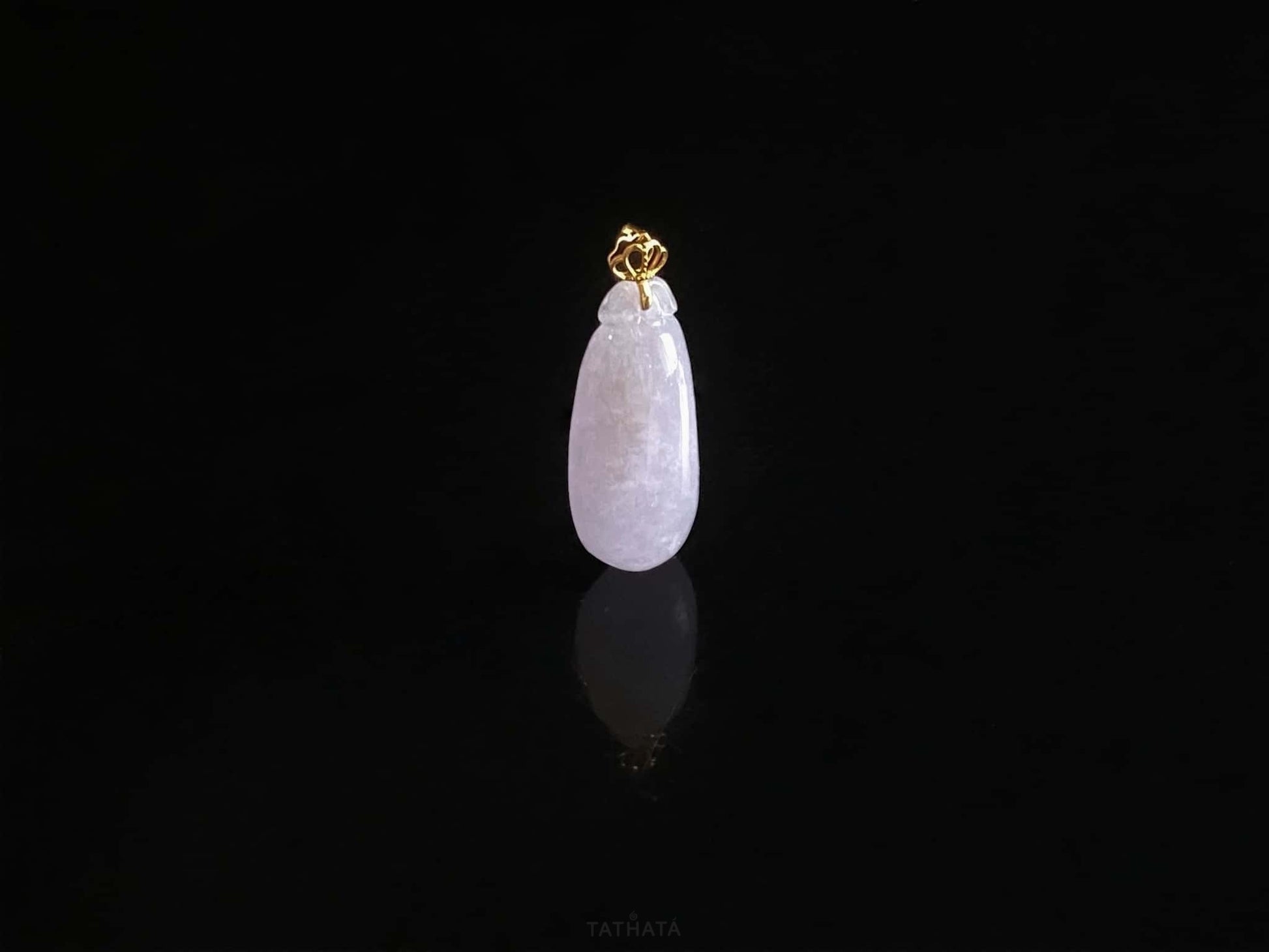 A lilac crown melon jadeite pendant.