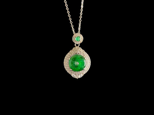 A verdant halo peace disc jadeite pendant.