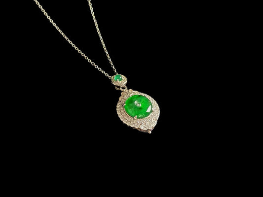 A verdant halo peace disc jadeite pendant.