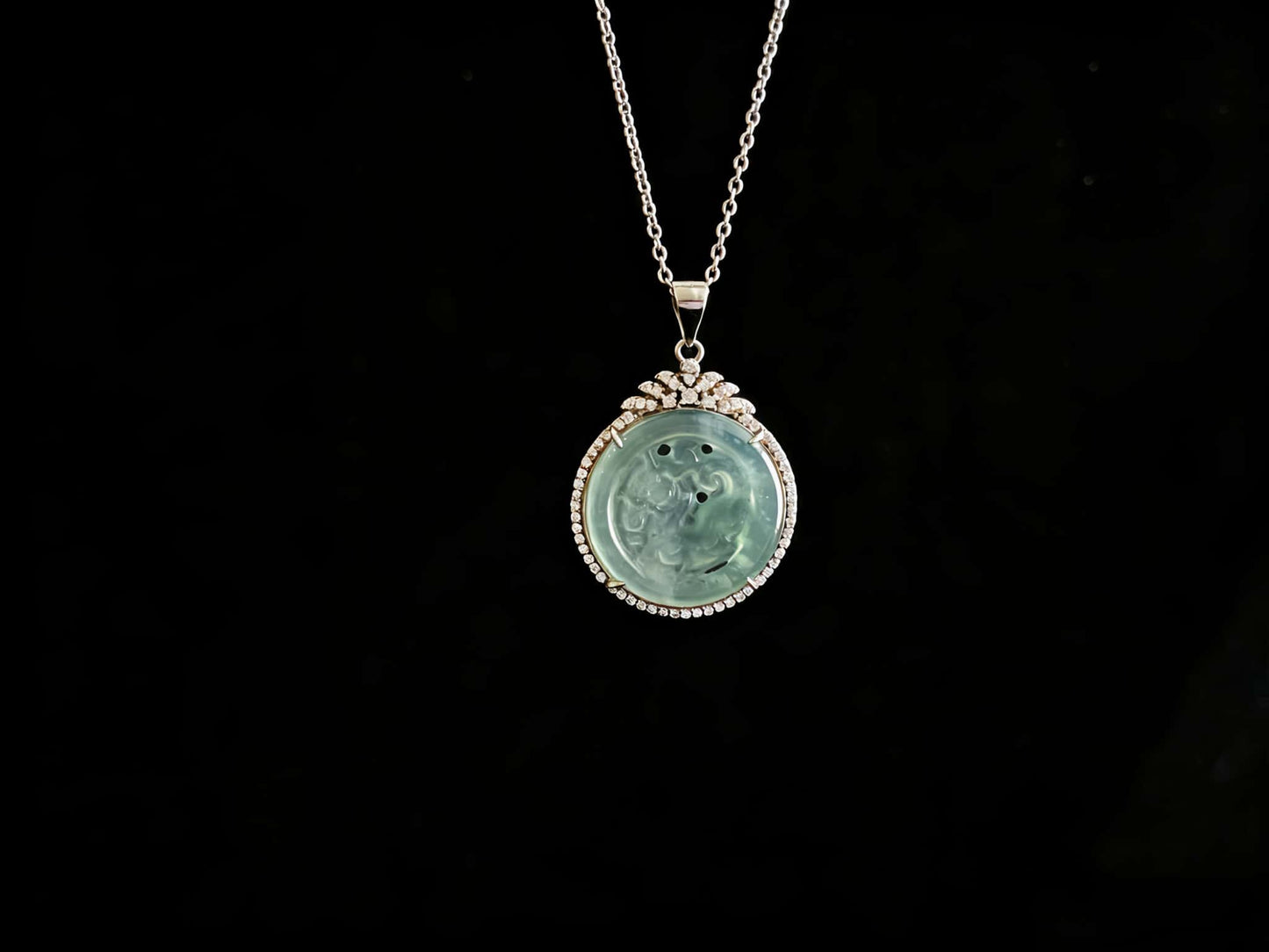 A ice aqua hollow carve halo jadeite pendant.