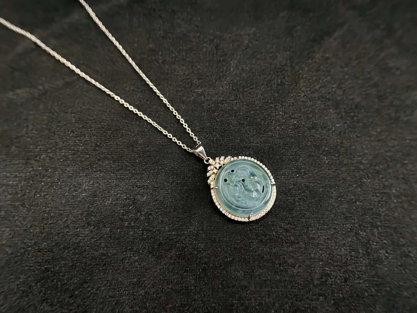 A ice aqua hollow carve halo jadeite pendant.
