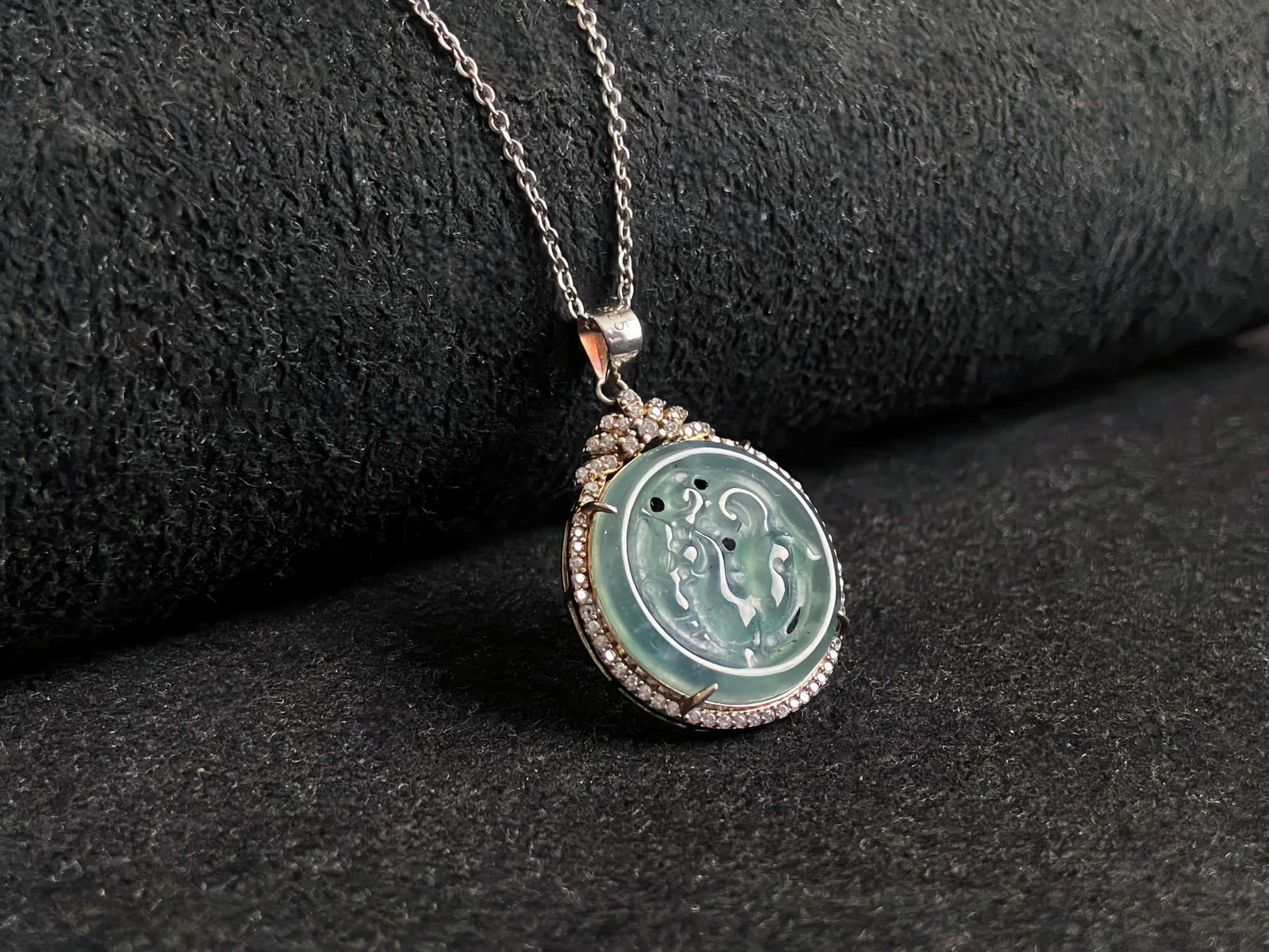 A ice aqua hollow carve halo jadeite pendant.
