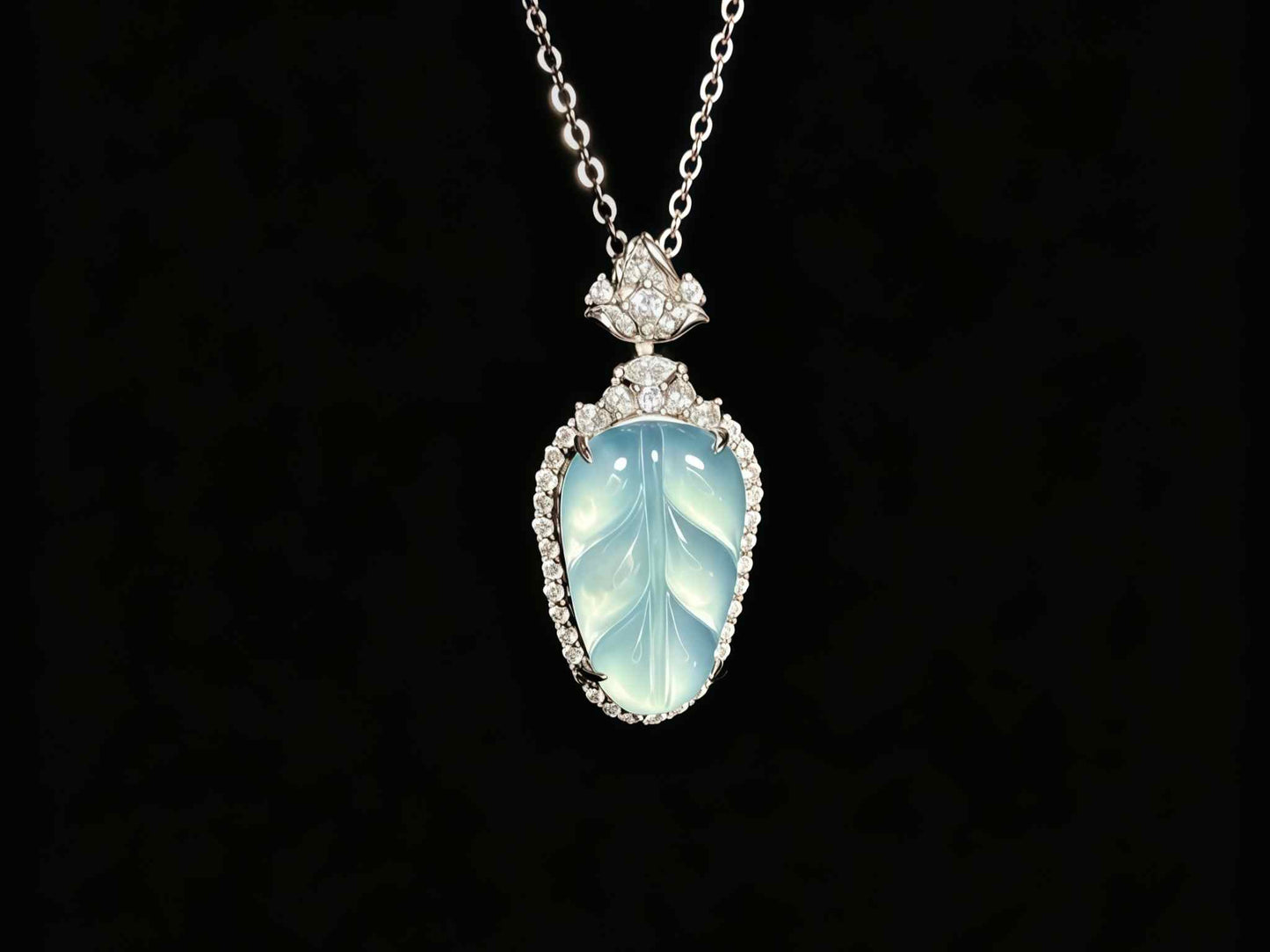 A clear ice blue leaf jadeite pendant.