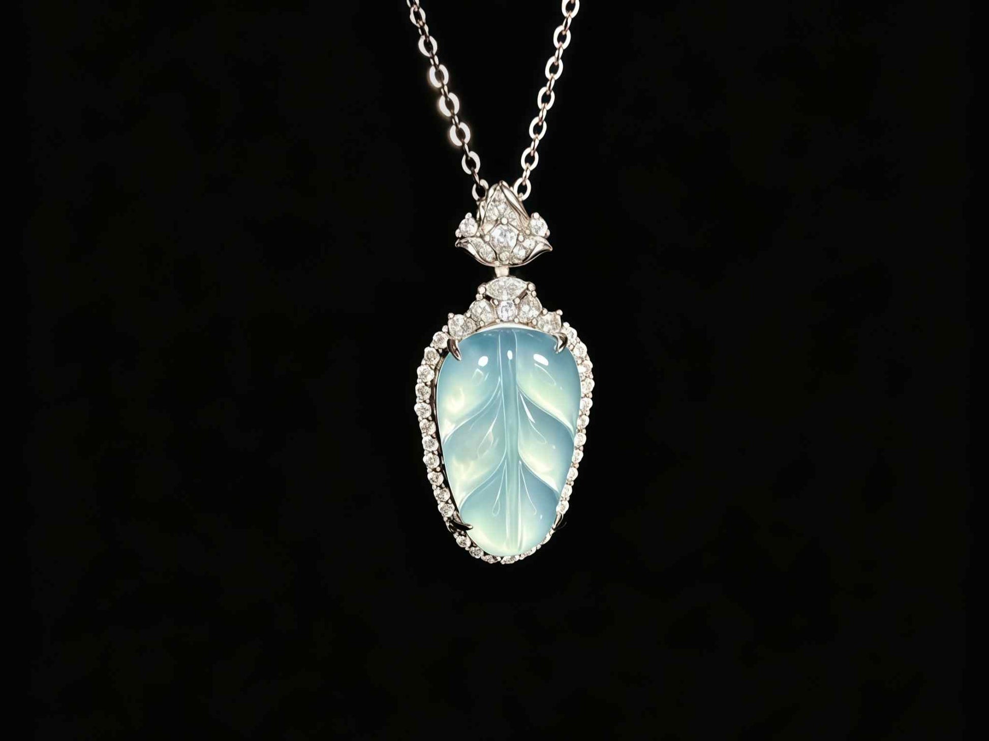 A clear ice blue leaf jadeite pendant.