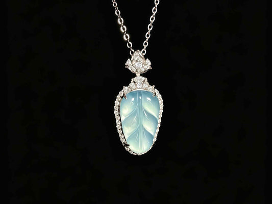 A clear ice blue leaf jadeite pendant.