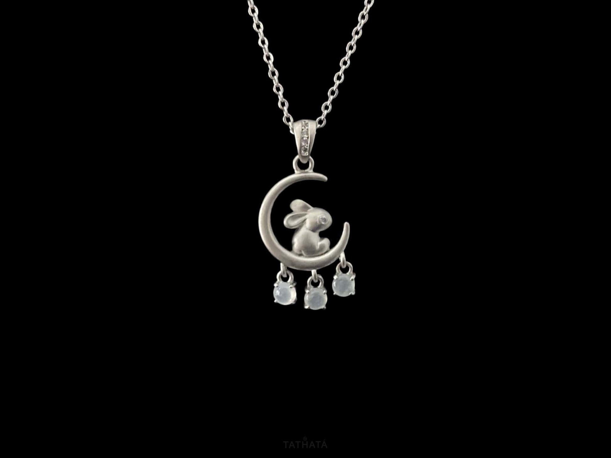 A moonlit hare spark jadeite pendant.