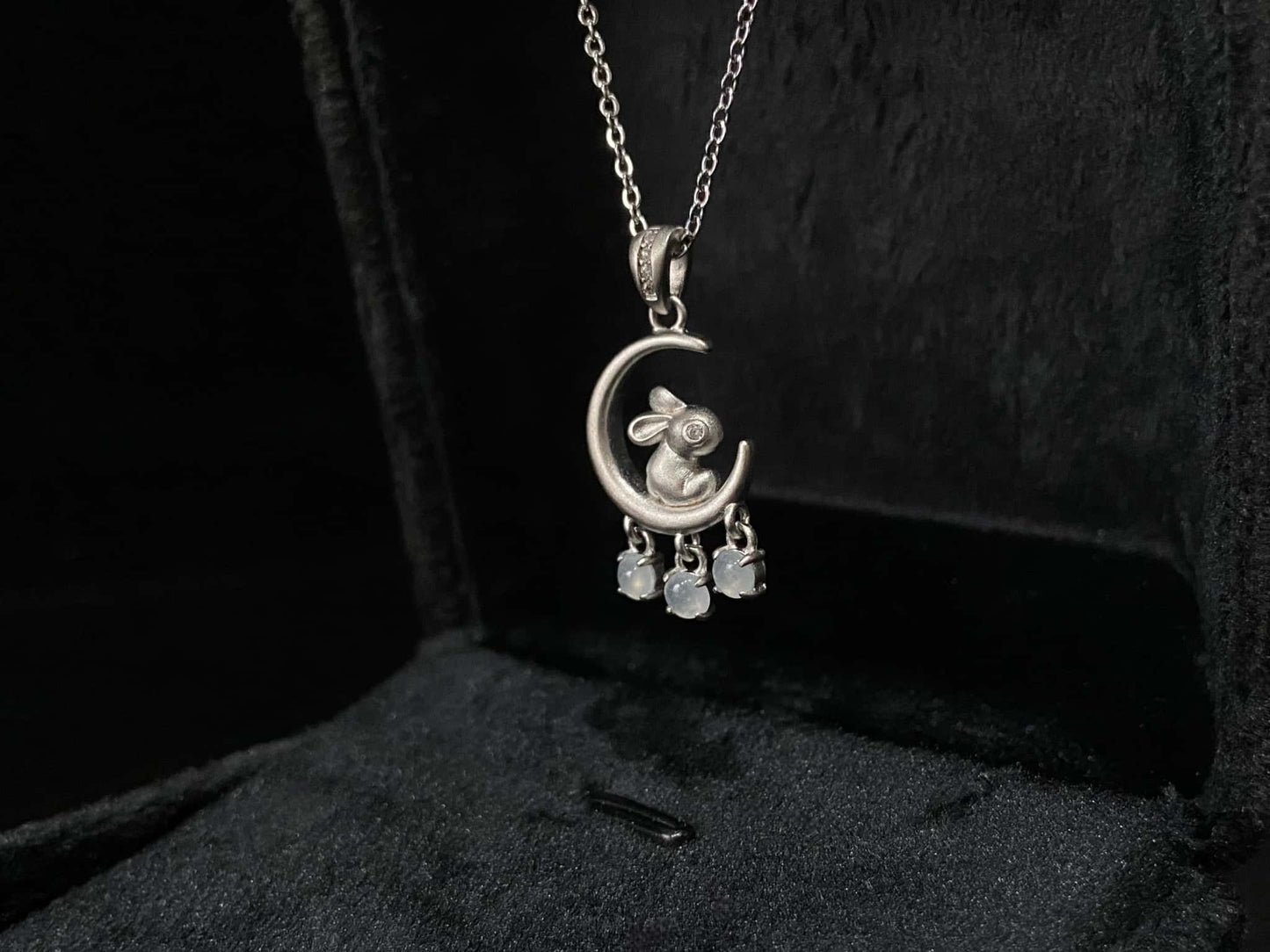 A moonlit hare spark jadeite pendant.