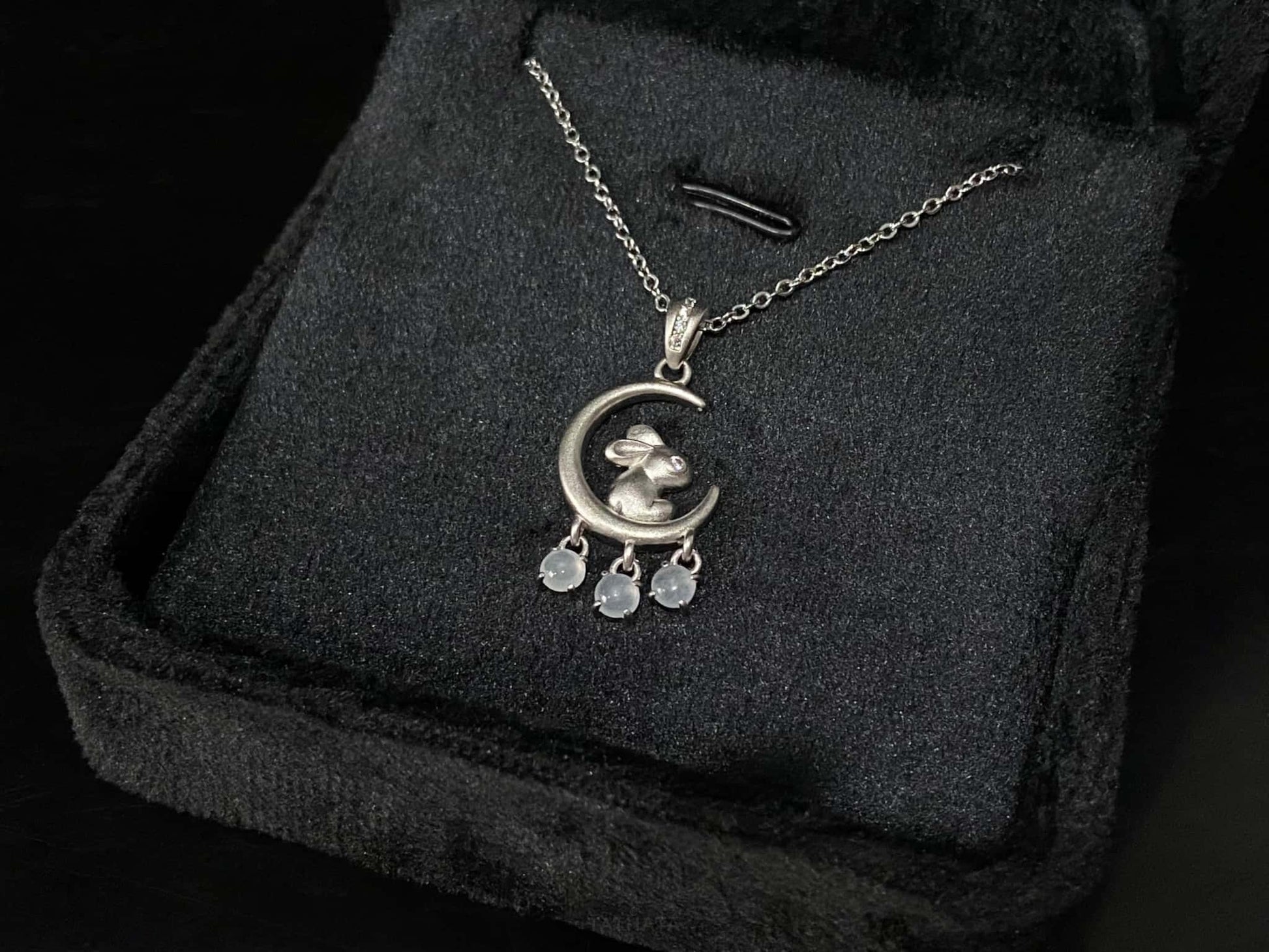 A moonlit hare spark jadeite pendant.