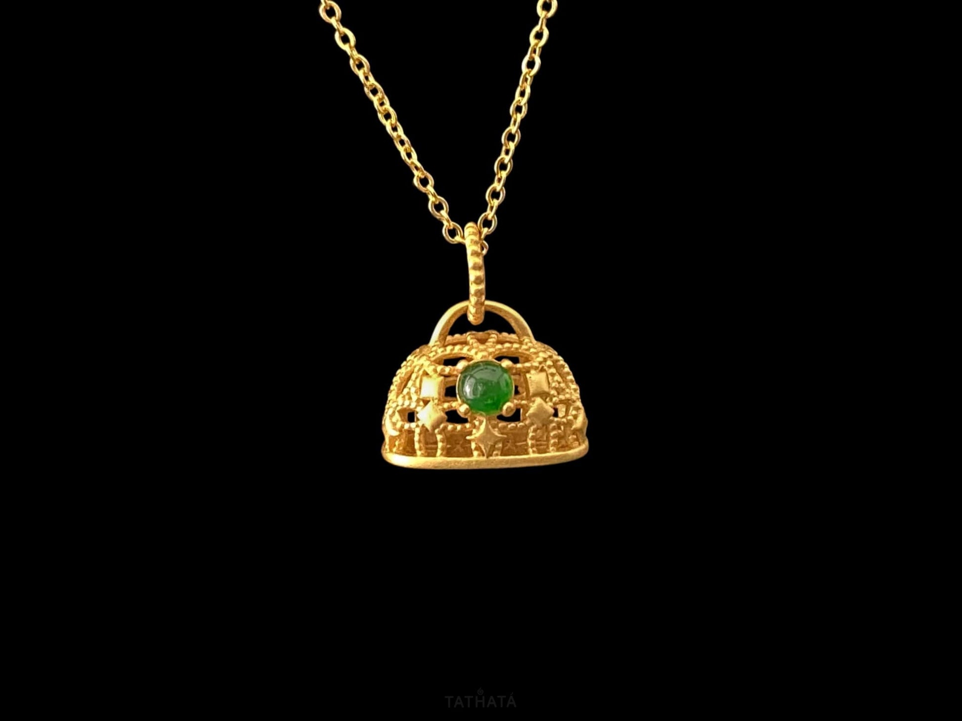 A auspicious green latch jadeite pendant.