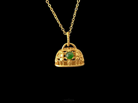 A auspicious green latch jadeite pendant.