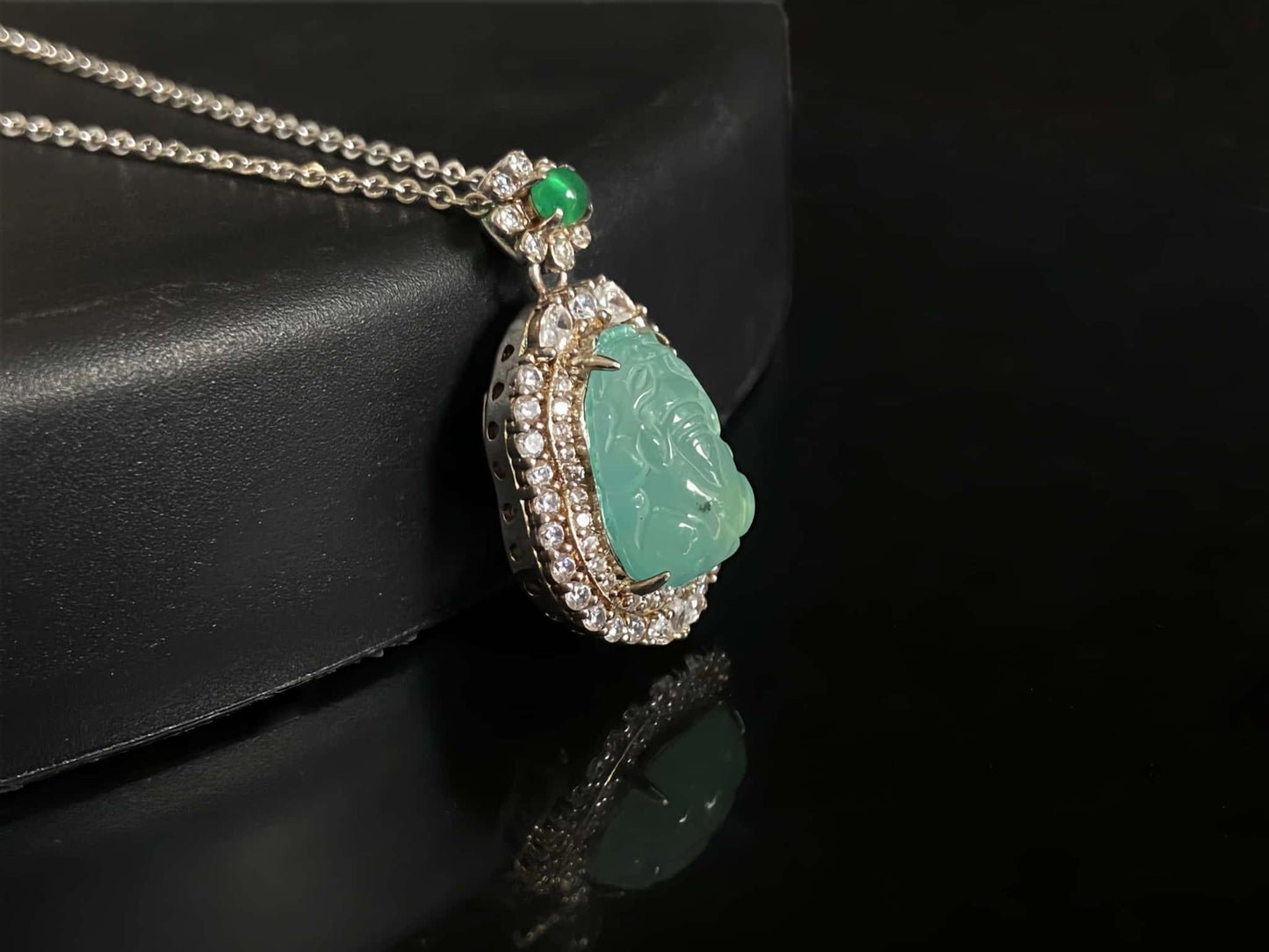A ice mint pixiu jadeite pendant.