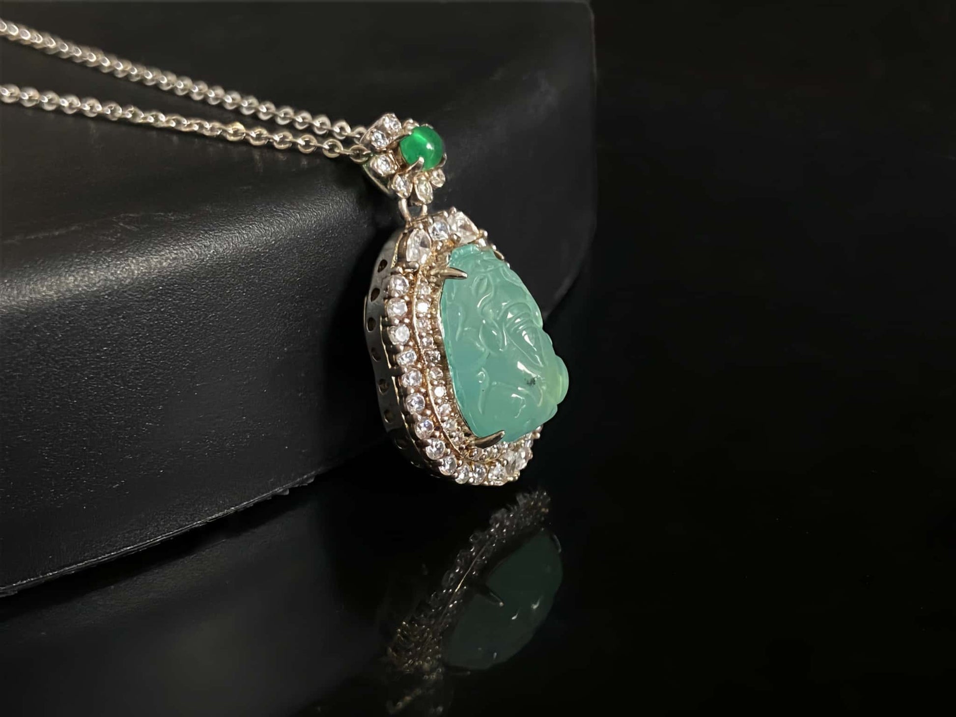 A ice mint pixiu jadeite pendant.
