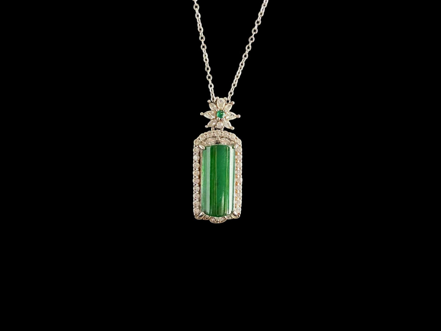 A rich green star frame jadeite pendant.