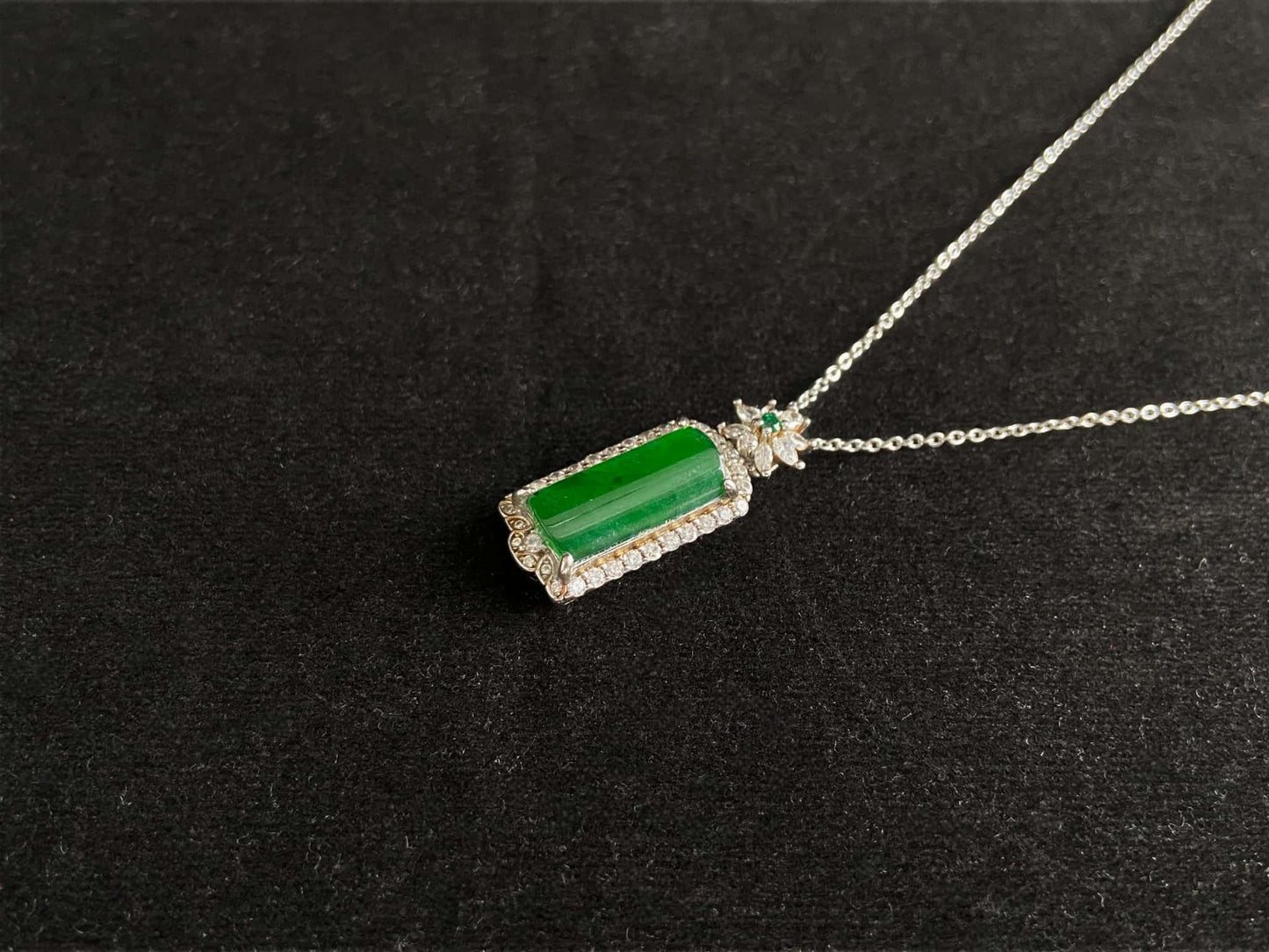 A rich green star frame jadeite pendant.