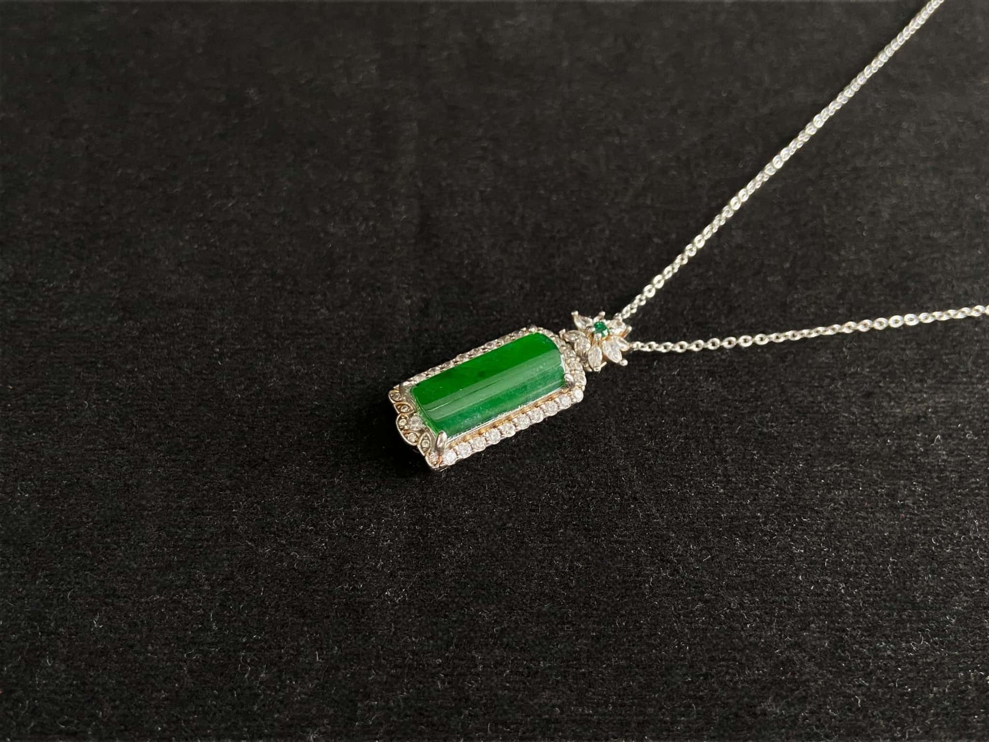 A rich green star frame jadeite pendant.