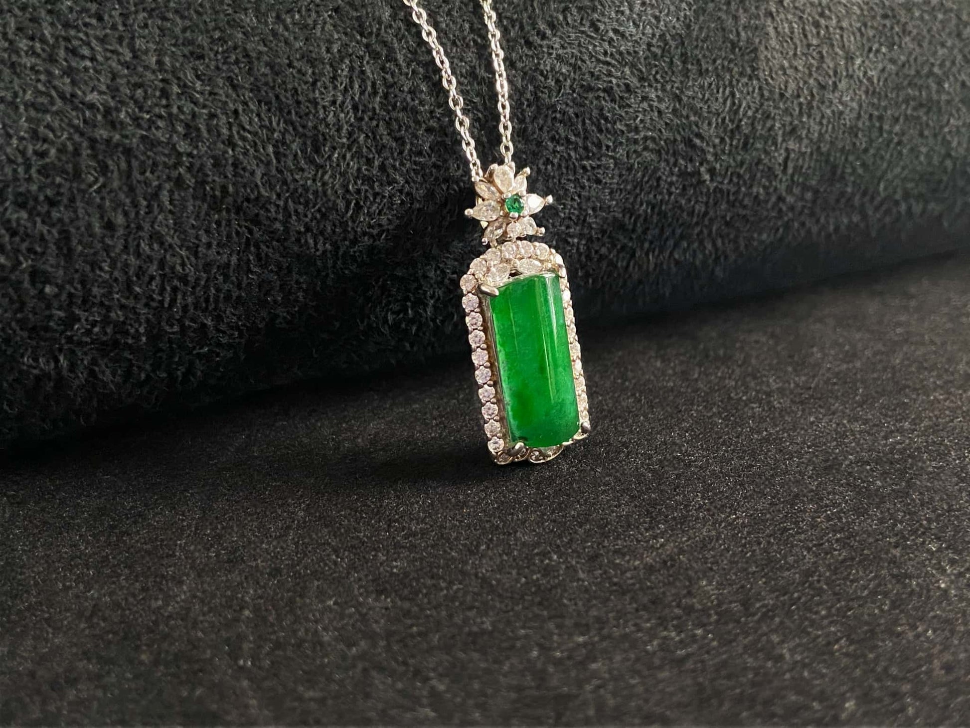 A rich green star frame jadeite pendant.