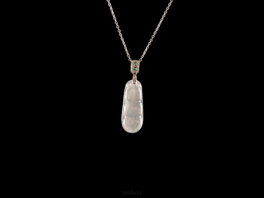 A glacial green bean jadeite pendant.