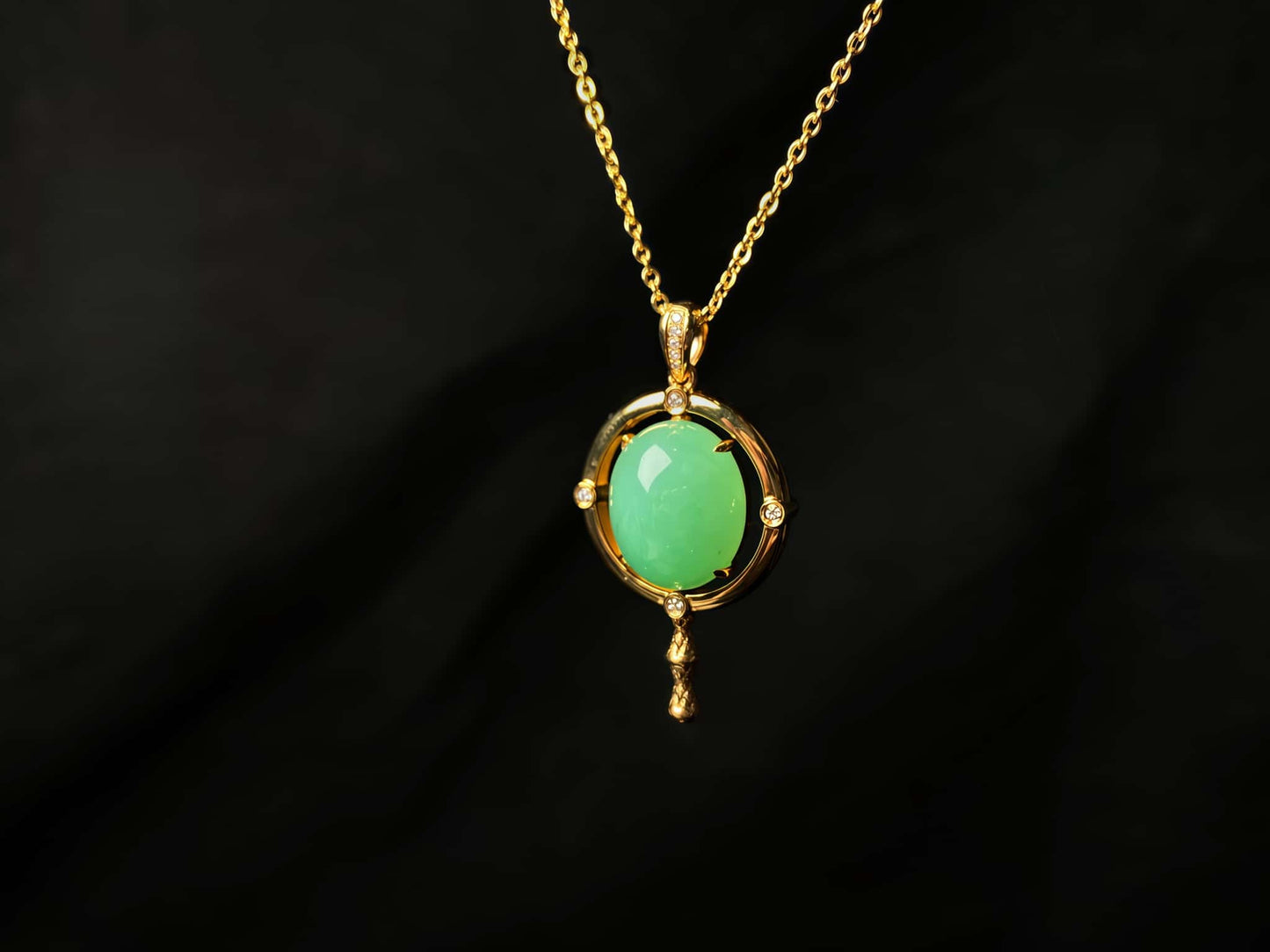 A apple green star finder jadeite pendant.