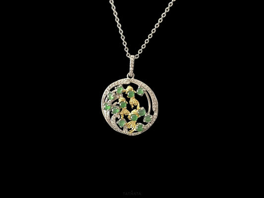 A green koi wreath jadeite pendant.