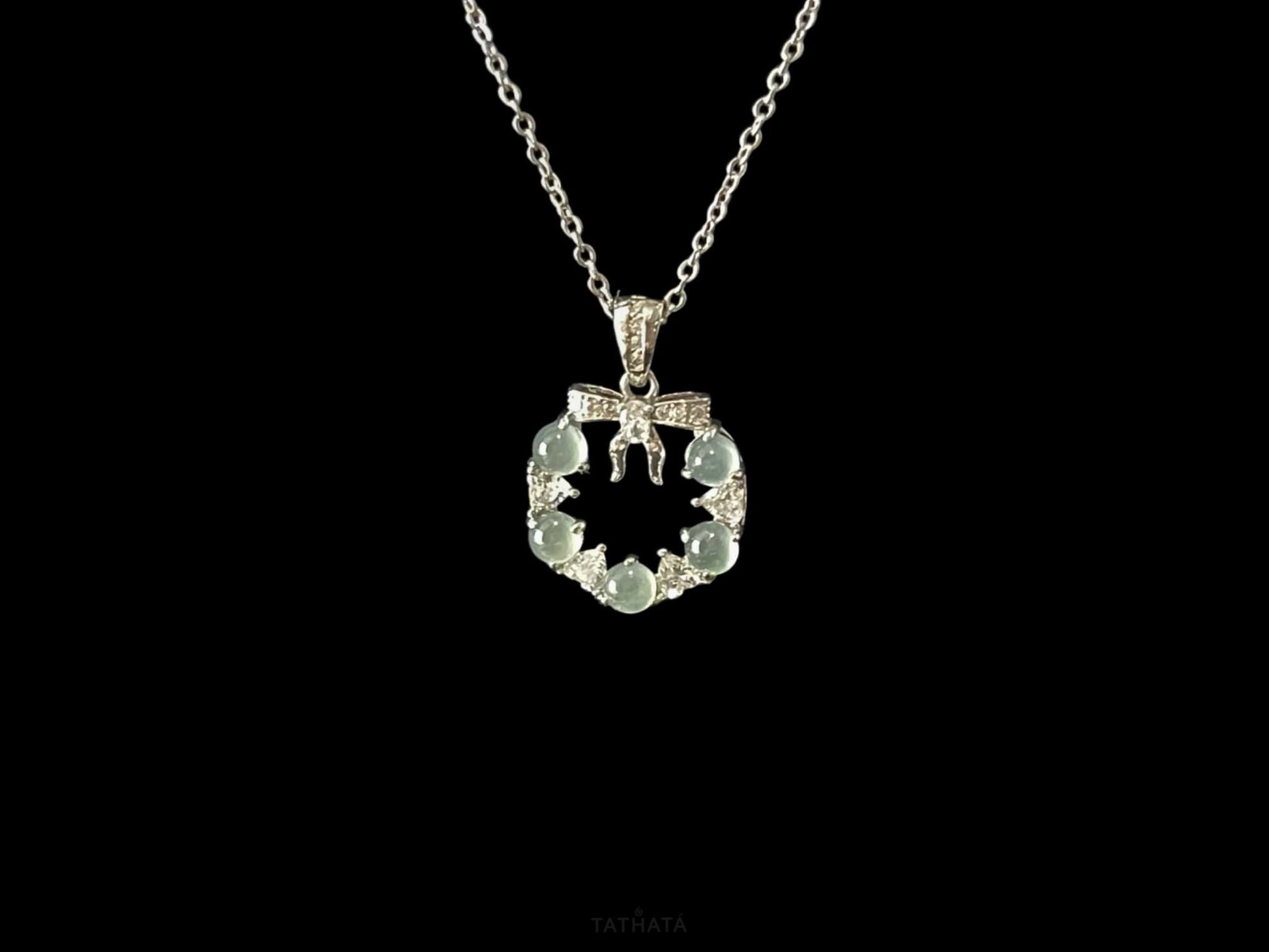 A icy bow wreath jadeite pendant.