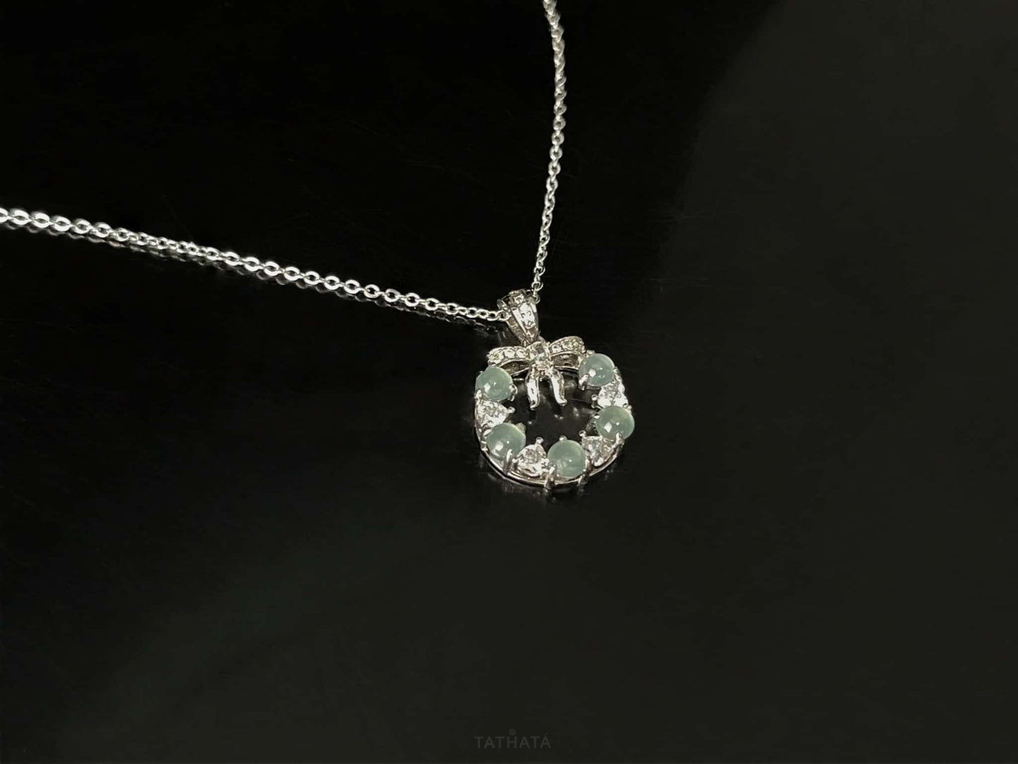 A icy bow wreath jadeite pendant.