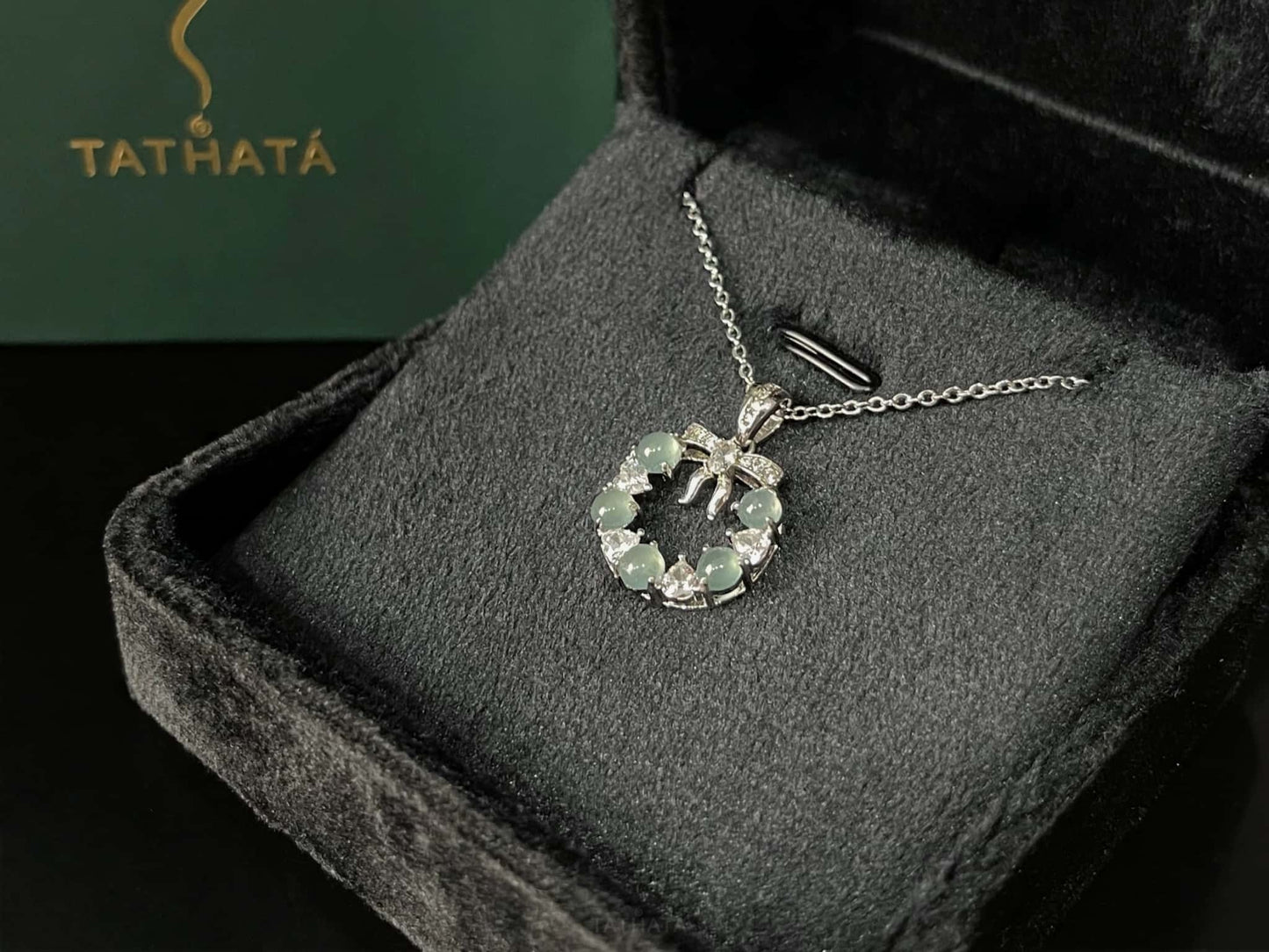 A icy bow wreath jadeite pendant.