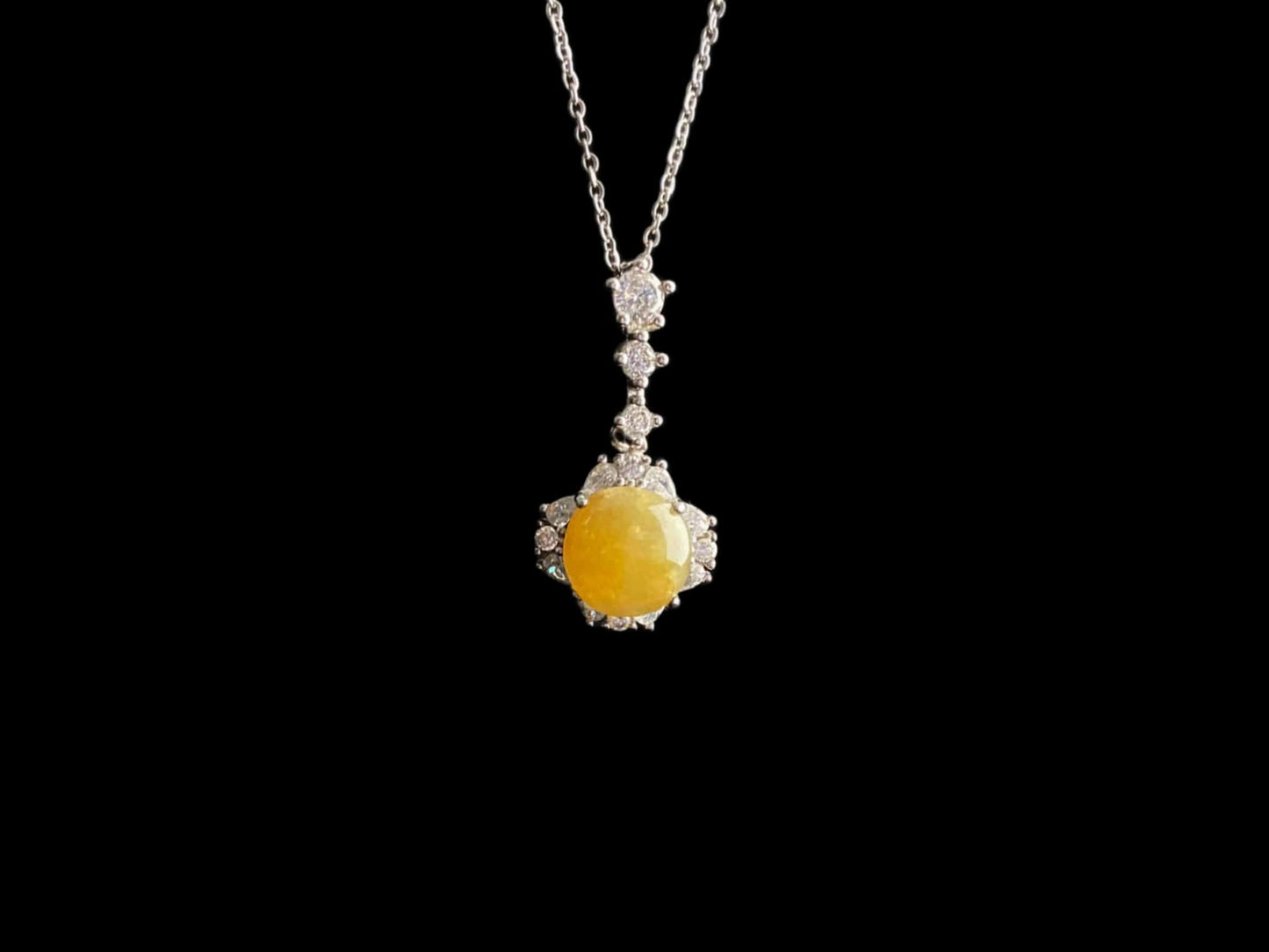 A warm sunlit core jadeite pendant.