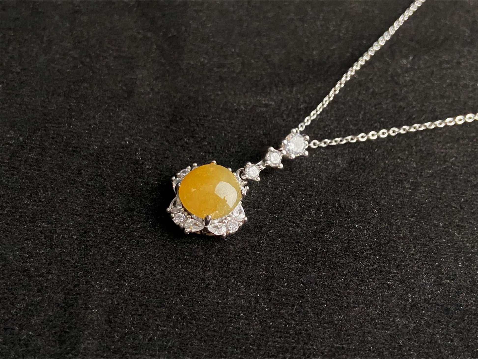 A warm sunlit core jadeite pendant.