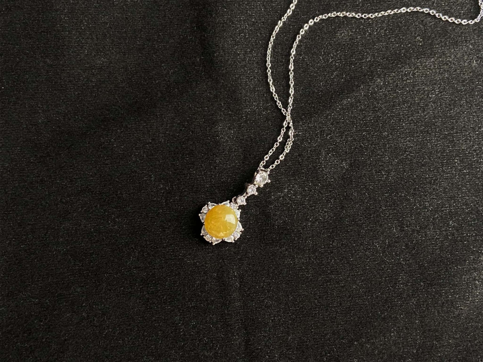 A warm sunlit core jadeite pendant.