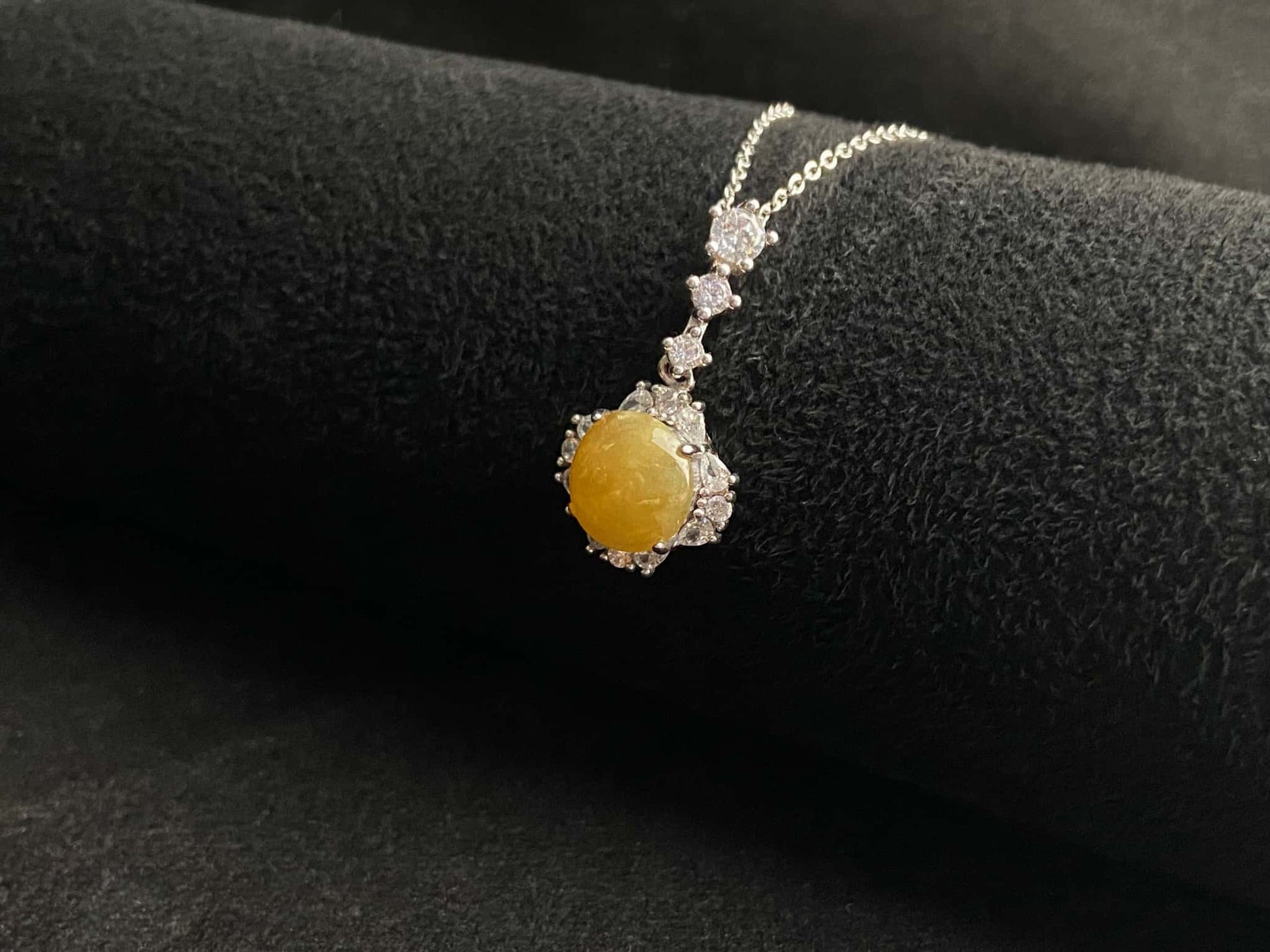 A warm sunlit core jadeite pendant.