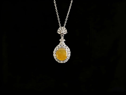 A sunset warm gold sparkle jadeite pendant.