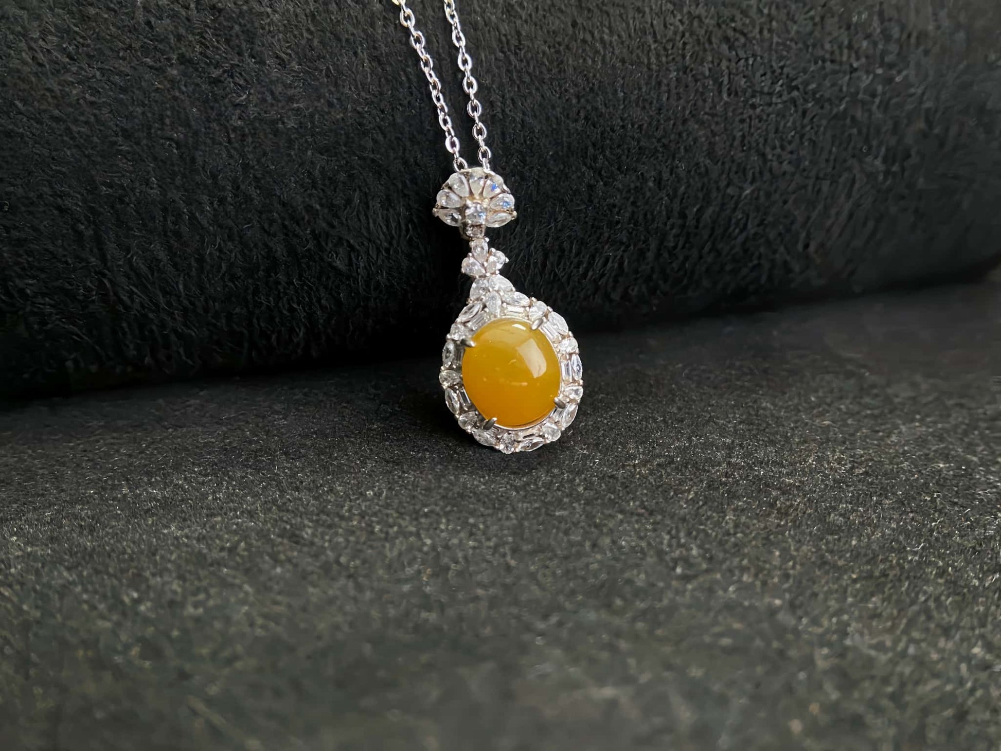 A sunset warm gold sparkle jadeite pendant.