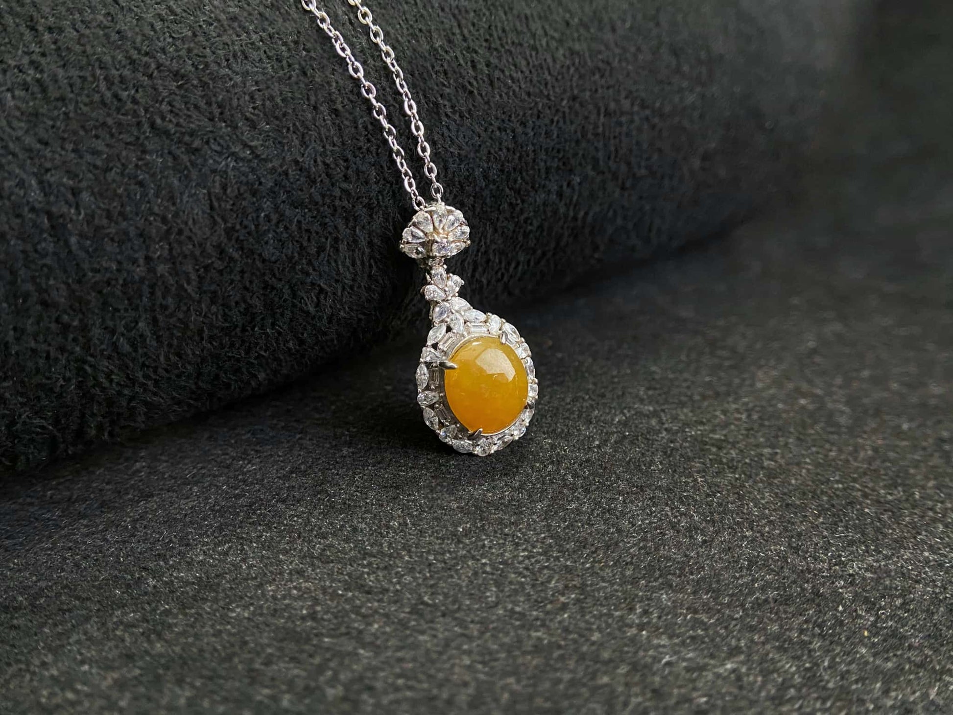 A sunset warm gold sparkle jadeite pendant.