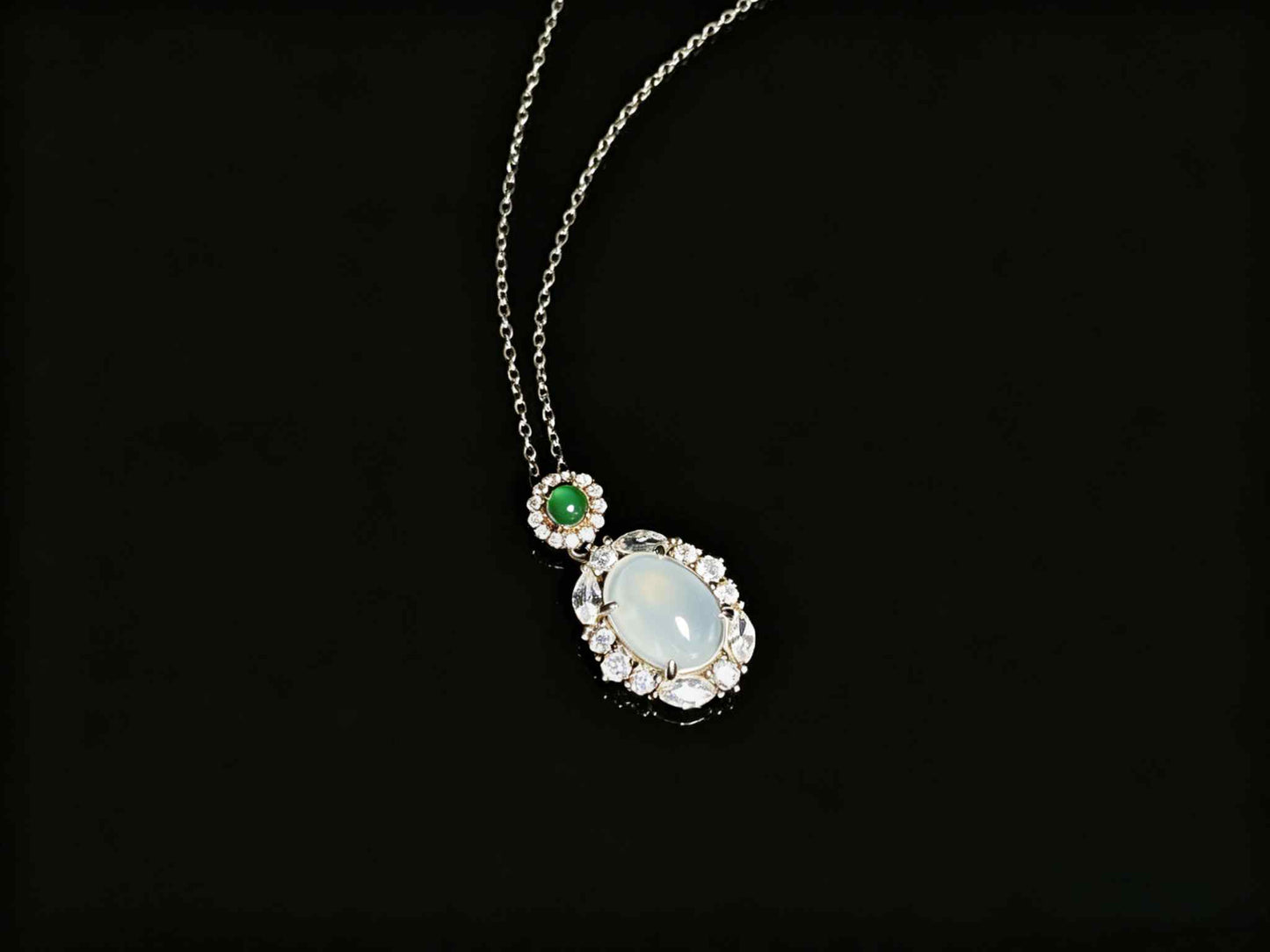 A elegant ice white green top jadeite pendant.