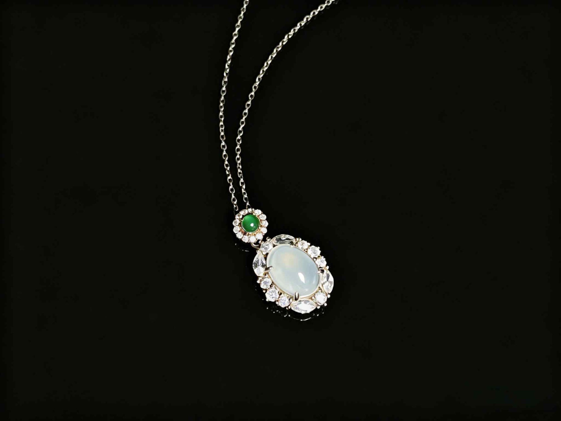 A elegant ice white green top jadeite pendant.