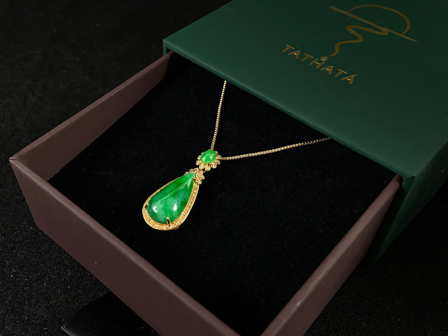 Imperial Jadeite meets sterling silver in this elegant pendant, masterfully uniting an oval and teardrop in one harmonious design.