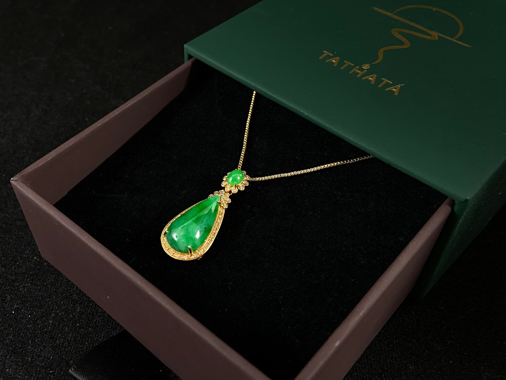 Imperial Jadeite meets sterling silver in this elegant pendant, masterfully uniting an oval and teardrop in one harmonious design.