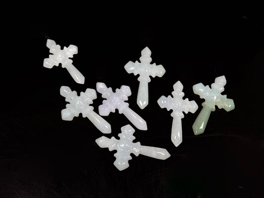 A milky white sword cross loose jadeite group.