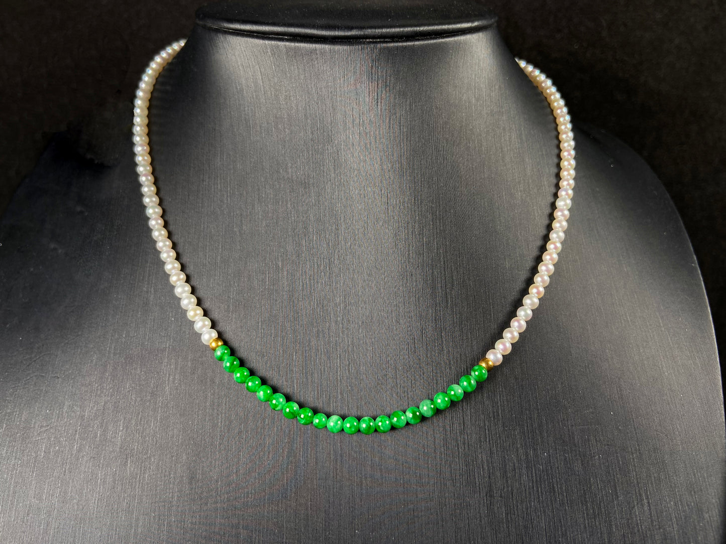 A soft pink freshwater pearl & vivid green jadeite beaded necklace.