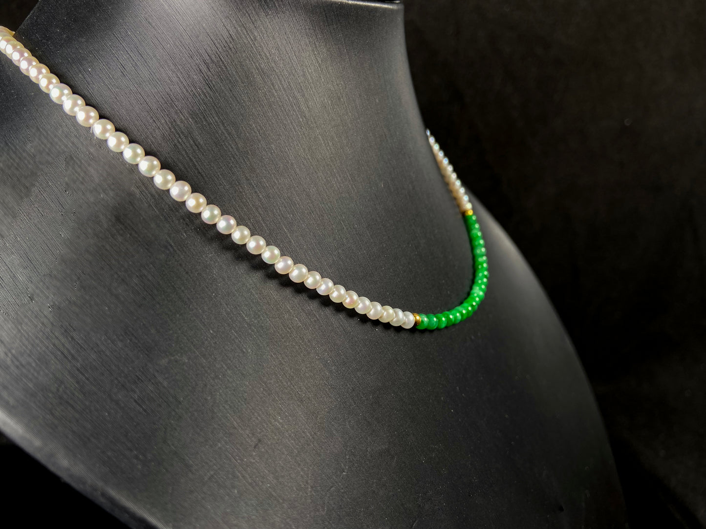 A soft pink freshwater pearl & vivid green jadeite beaded necklace.