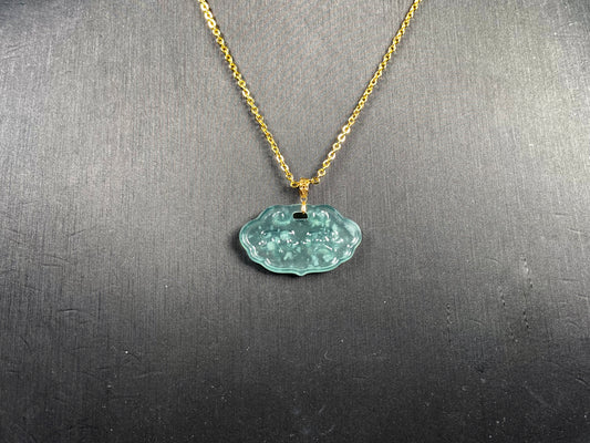 A floating flower icy blue jadeite pendant.